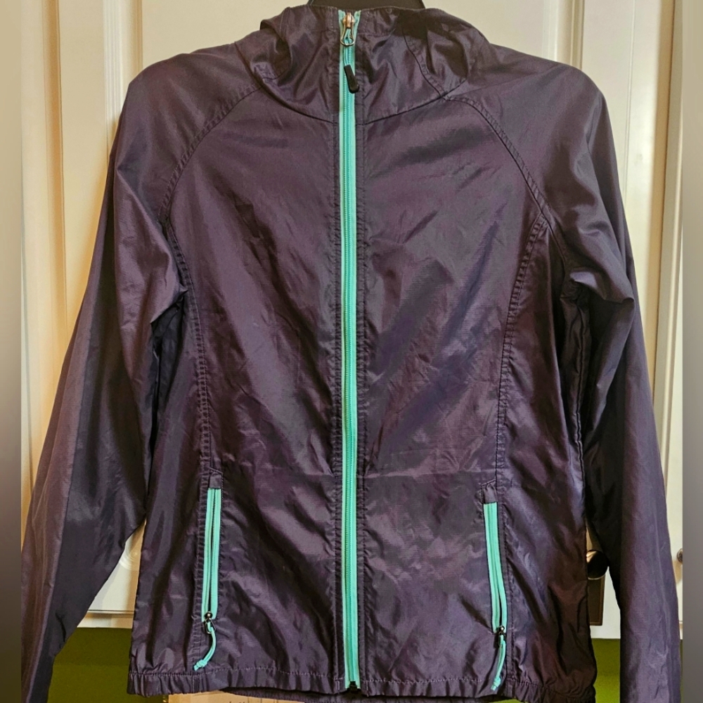 The North Face Women's Purple Windbreaker Jacket with Teal Zippers